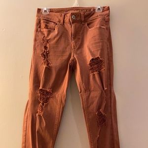 Terra Cotta Distressed American Eagle Jeans
